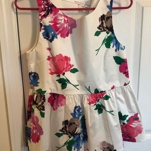 Floral peplum sleeveless top